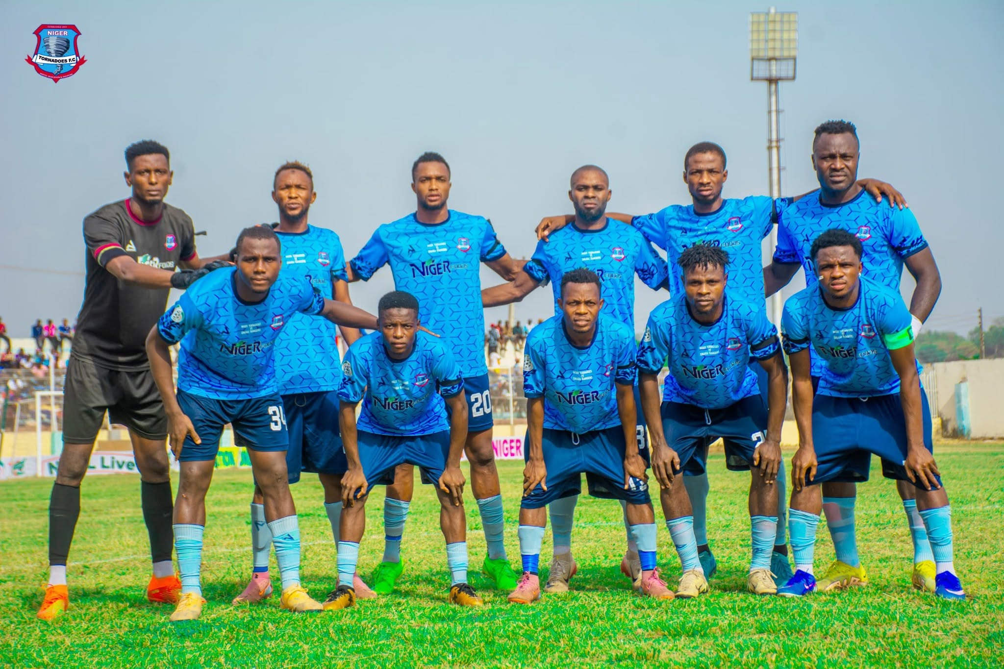 Niger Tornadoes FC team photo lined up before kickoff